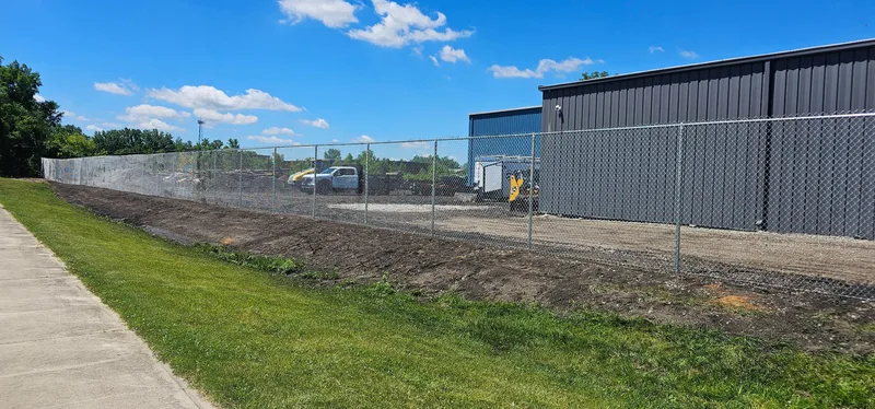 Galvanized chain link commercial perimeter fence installation, Northern Indiana
