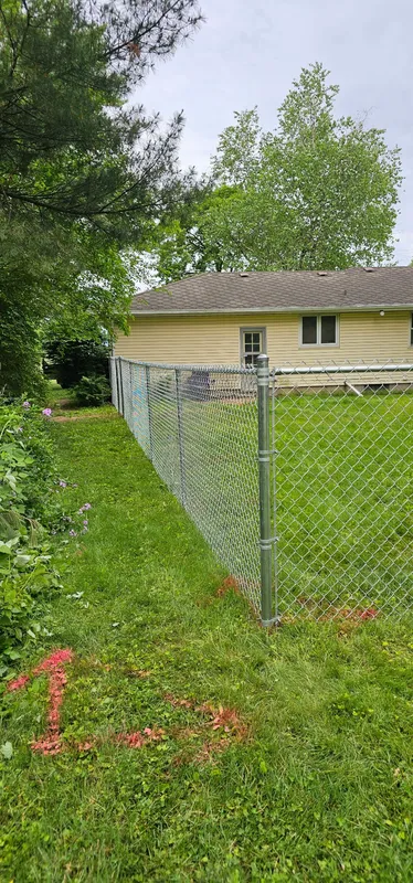 Chain link fence with post detail, residential installation in Northern Indiana